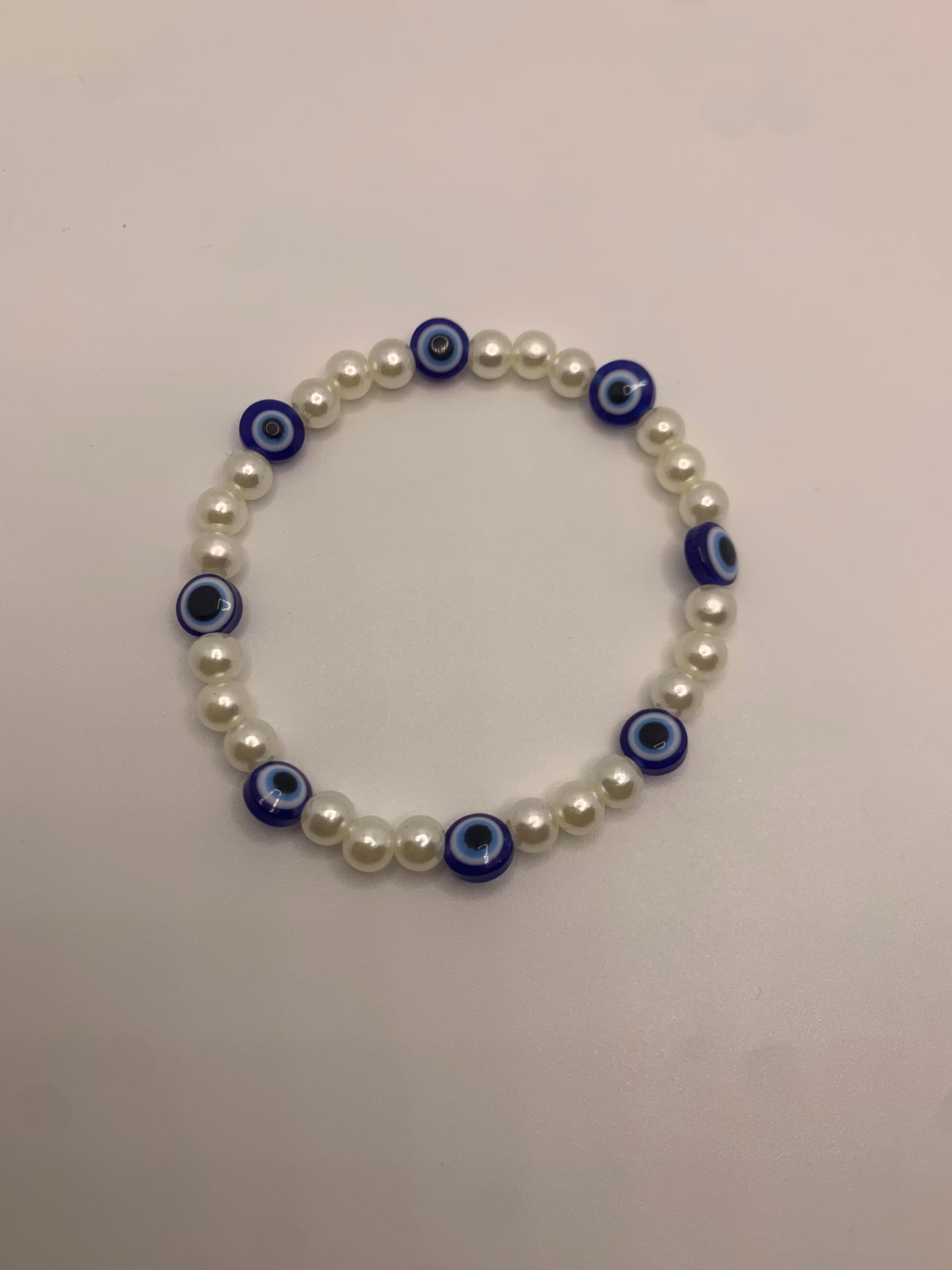 Pearl evil eye