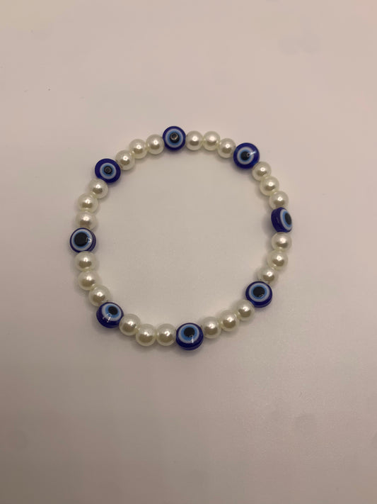 Pearl evil eye